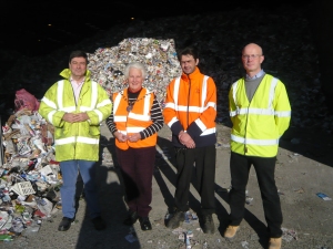 A pile of recyclables ready for sorting with Fernando (the boss of the Envirosort plant), myself, Mark and Richard (Worcestershire County Council)